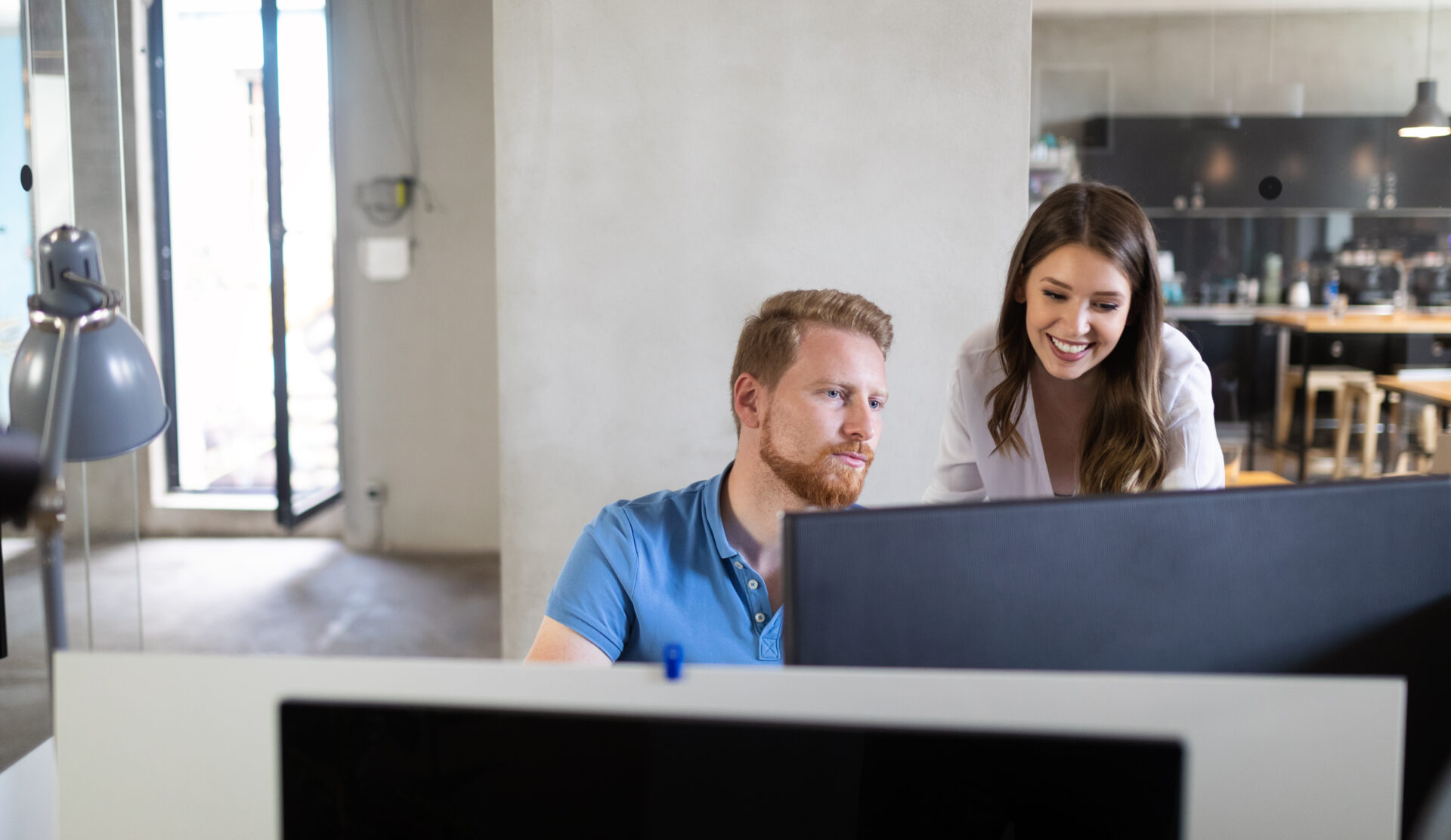 Group of business people collaborating on project in office