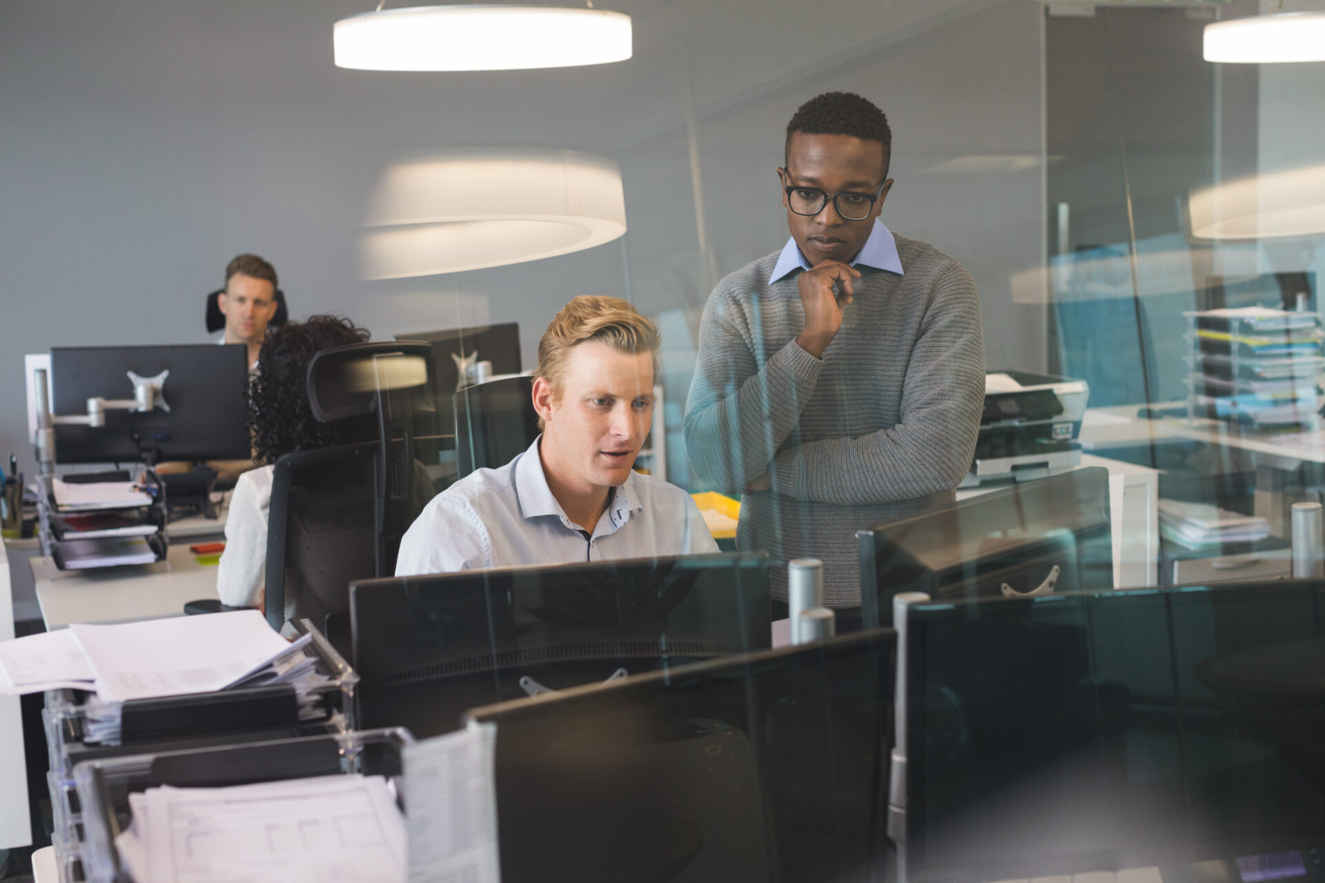 Focused business colleagues working at desk