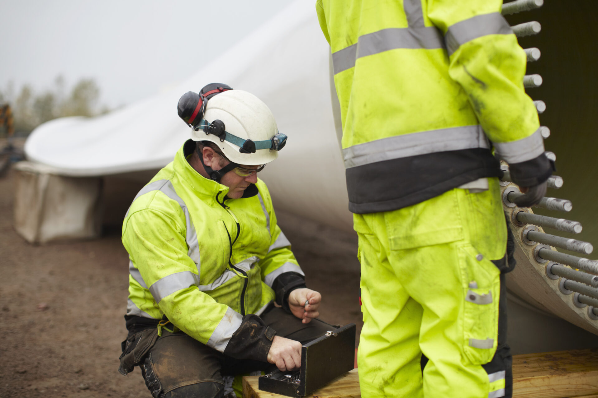 Engineers working on wind turbine
